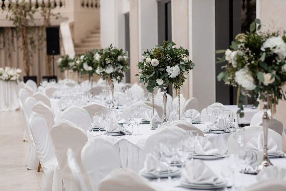 A grand hotel with a pool for an upcoming event.